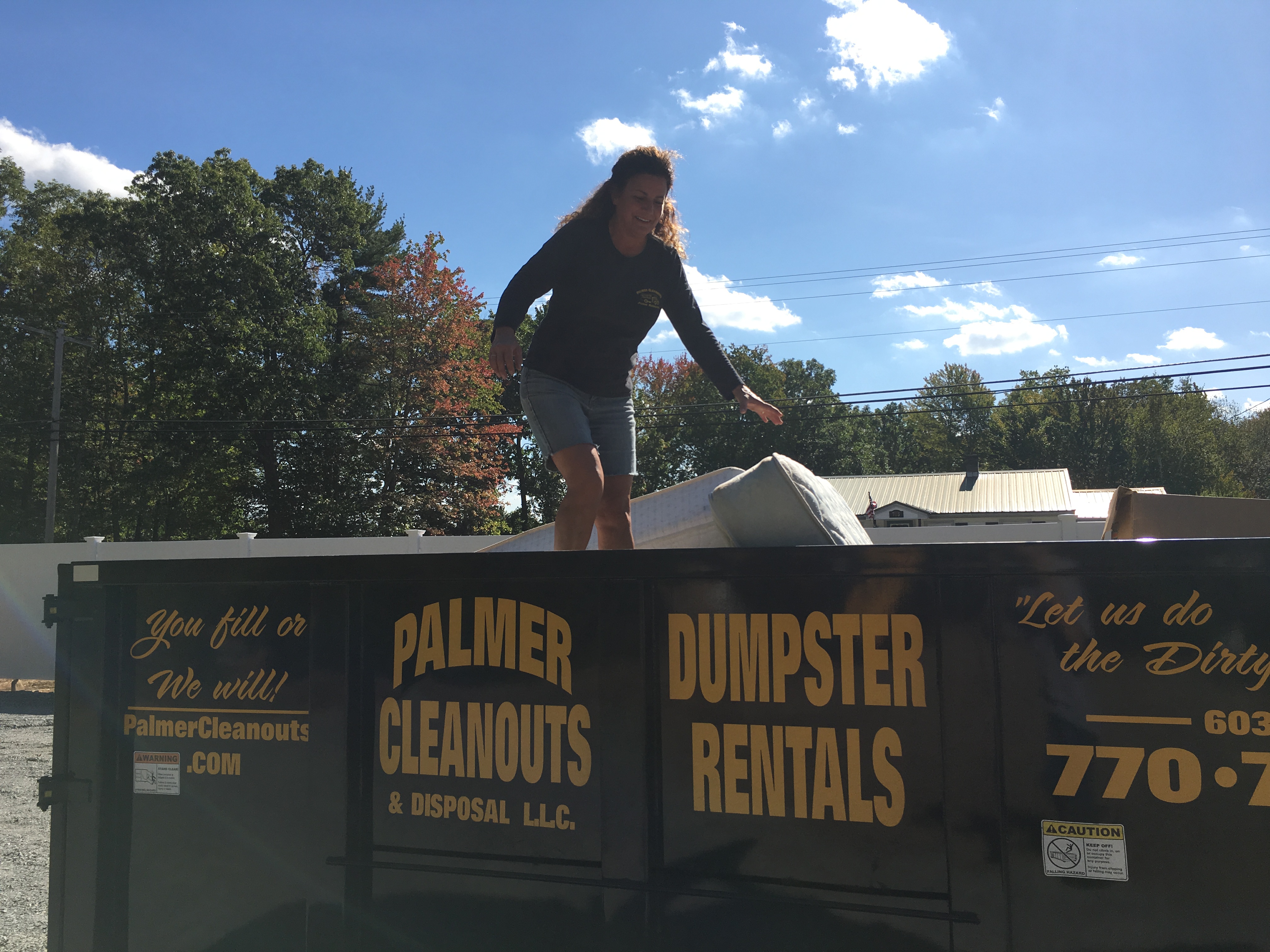 Palmer Cleanouts- Loading A Dumpster